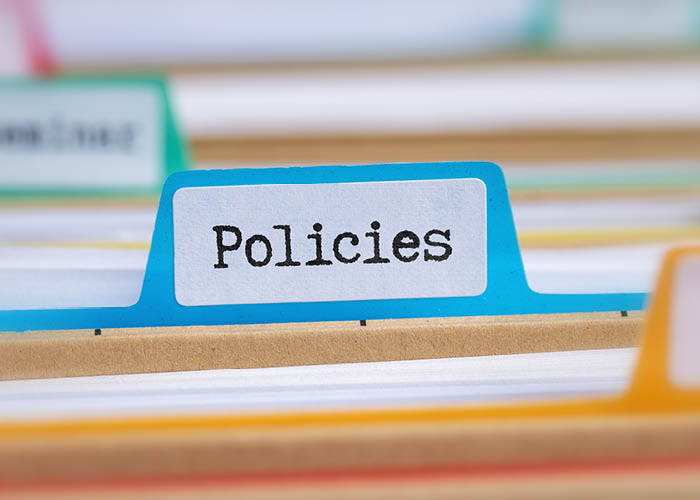 File folder with the word Policies on the tab